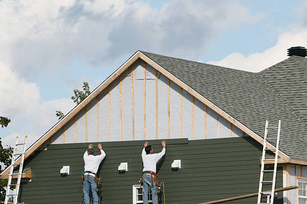 Professional Emergency Siding Repair technician working in Elrama, PA